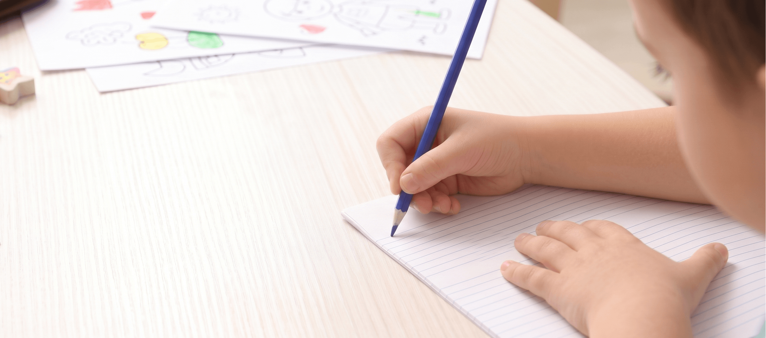 Child practising writing and spelling as part of Sounds-Write phonics instruction